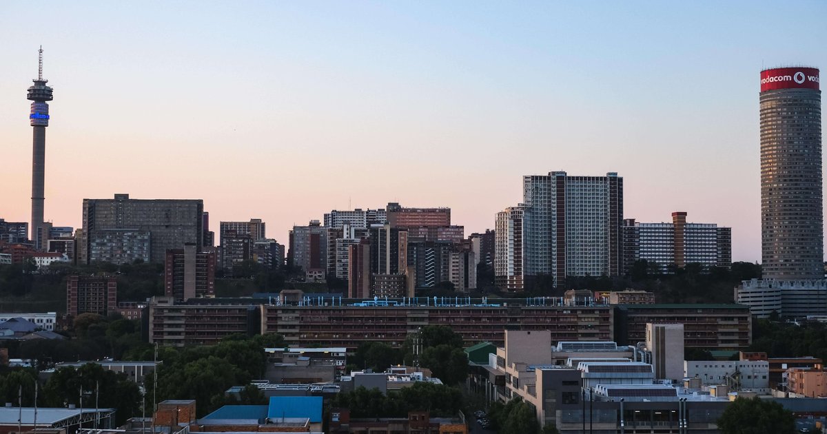 johannesburg skyline dusk cost of living vs cape town 2026