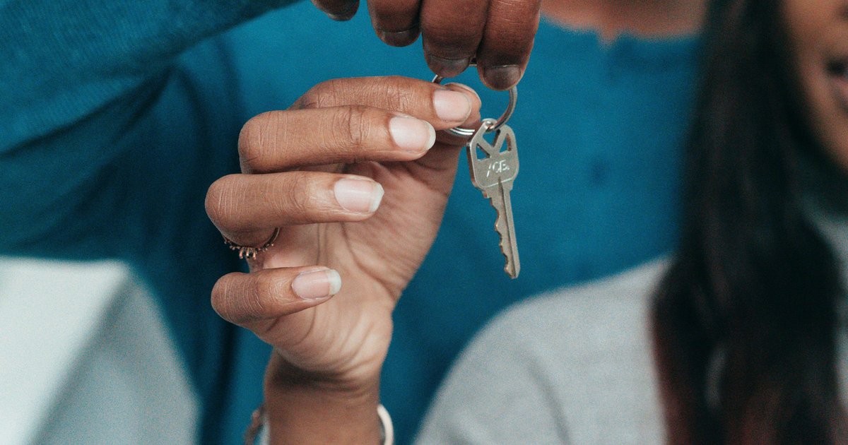 House keys handover representing rent vs buy decision South Africa 2026