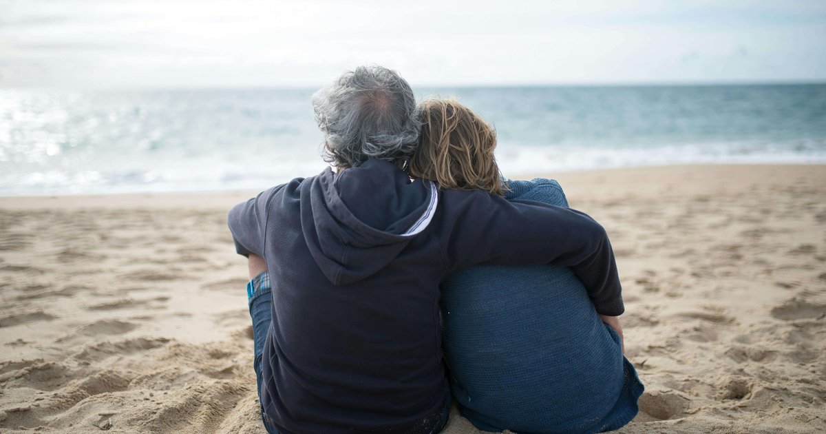 Older couple on beach representing superannuation retirement savings Australia